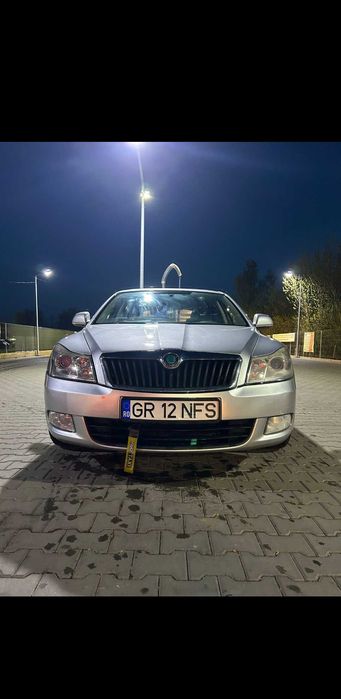 Skoda Octavia 2 – 2011, benzină, manuală – 190.000 km