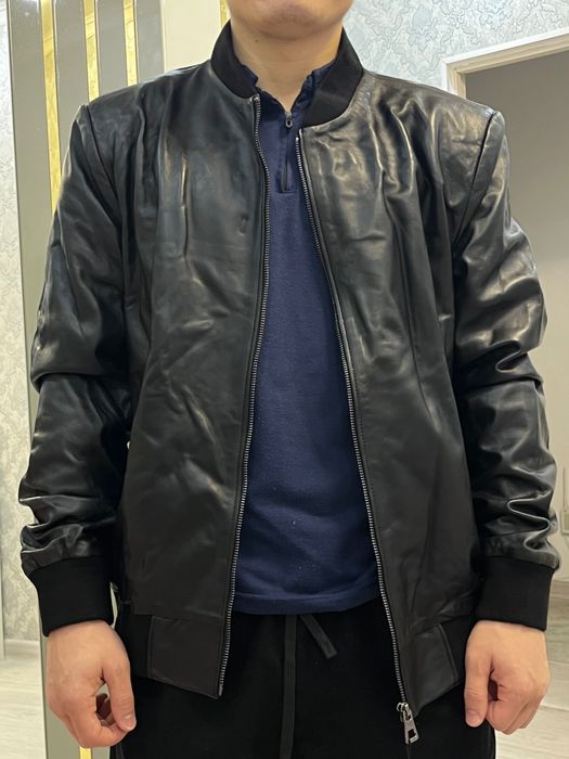 Новая кожаная куртка с этикеткой