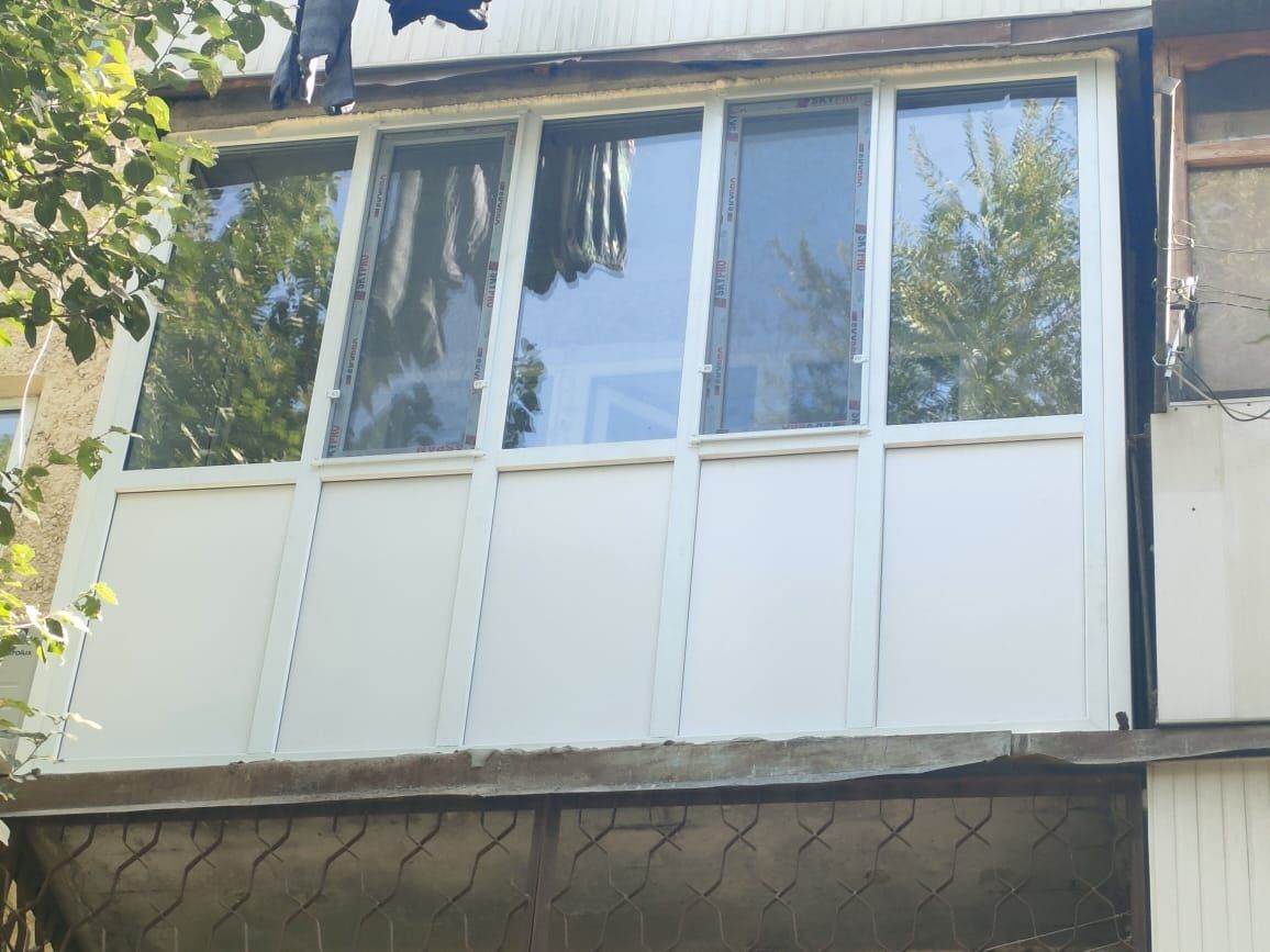 Пластиковые окна двери балконы