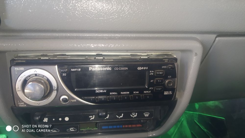 Авто магнитола аригинал Панасоник  аух радио диск хаммаси ишлайди