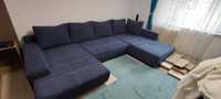 Canapea din stofă bleumarin cu funcție de pat și depozitare