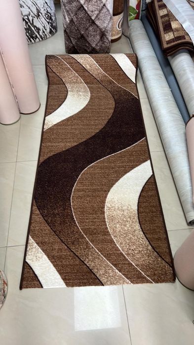 Мокетени килими и пътеки с гумирана основа