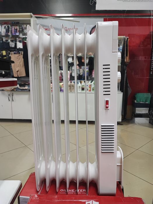 Электрический обогреватель, масляный радиатор