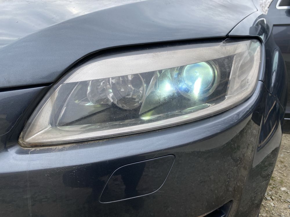 Faruri Xenon St/Dr Audi Q7 (4L)Pret 1400 lei bucata in stare perfecta
