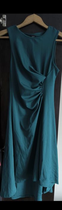 Нова  необличана рокля