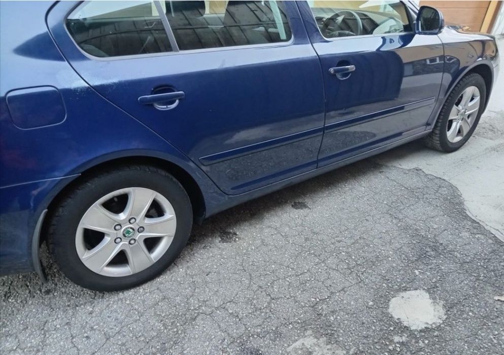 Dezmembrez Skoda octavia 2 facelift 1.6 tdi 105 cp cayc albastru LF5A
