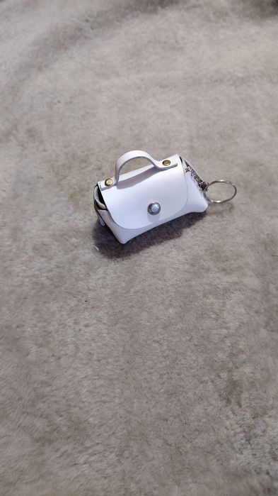 Mărturii de nunta sau botez gentuță din piele naturala lucrate manual