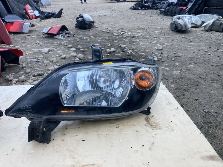 Оригинални фарове за Мазда 2 2002- 2006