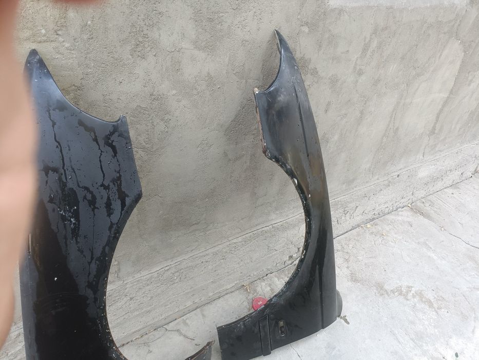 Продам крылья от бмв Е39