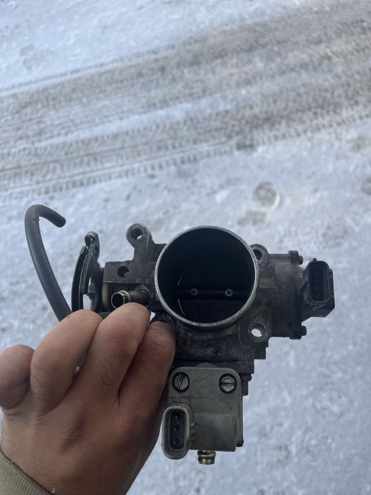 Дросленный заслонка