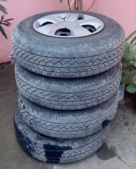 Patru roți cu jante tablă, cauciucuri all season. 175/80 r14