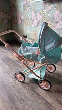 Детская коляска игрушечная