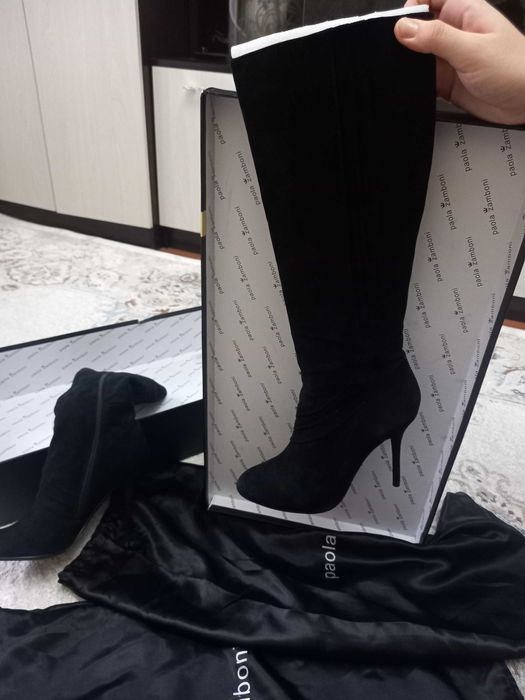 Итальянские новые сапоги.