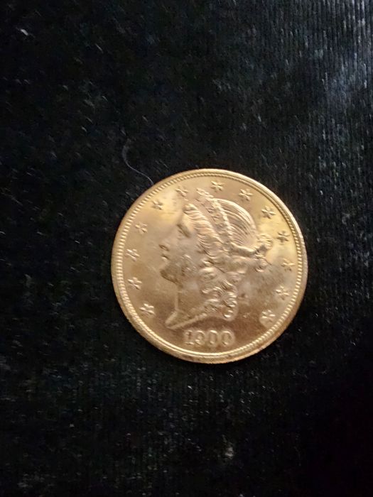 Златна монета 20 американски долара.