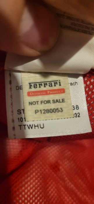 Sapca Scuderia Ferrari cu origine din echipa de F1 Ferrari