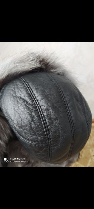 Продам кожаную шапку ушанку с хвостом