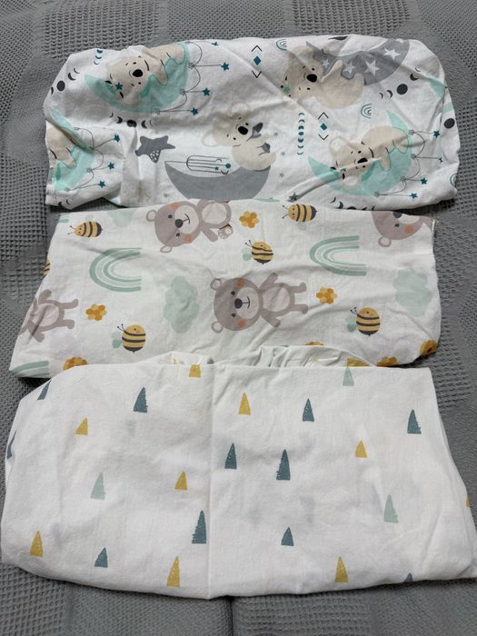 Бебешки възглавници, чаршафи и чувалчета, нови или отлични