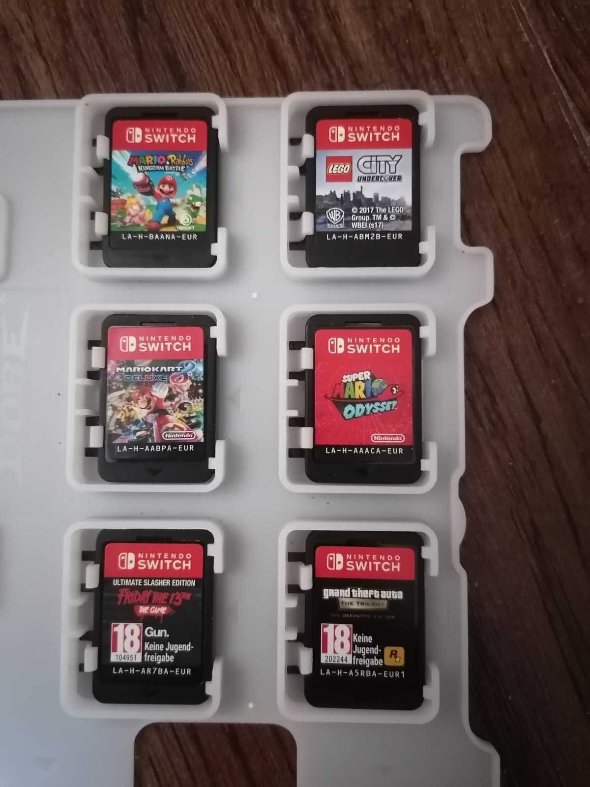 Vand  Nintendo Switch + geantă Dobe + 6 jocuri + accesorii