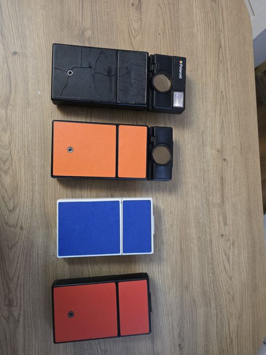 Camere pliabile polaroid SLR680 și SX-70