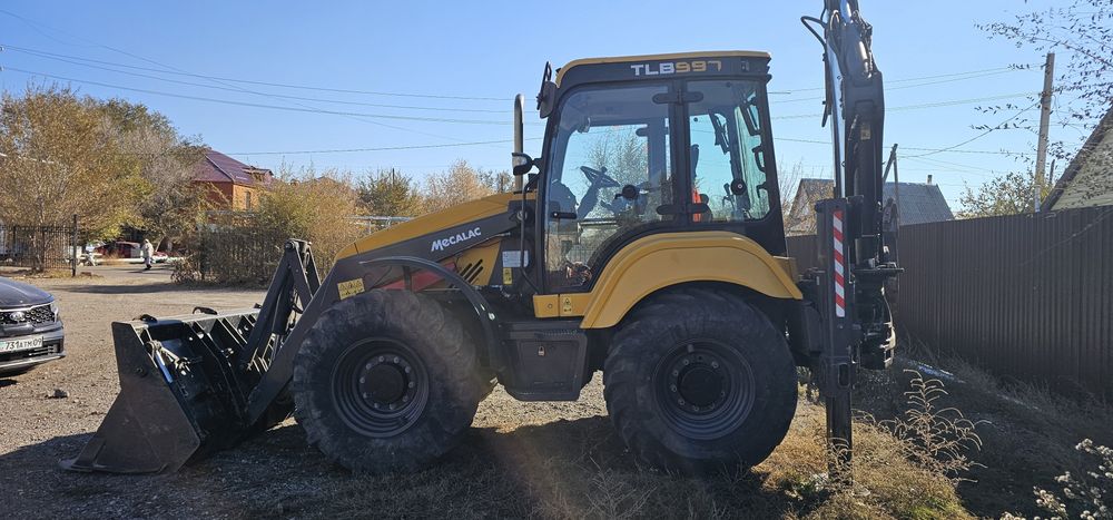 Аренда колесного экскаватора погрузчика с оператором