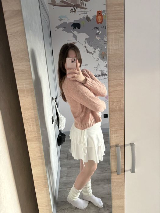 Белая юбка с бантиками по бокам