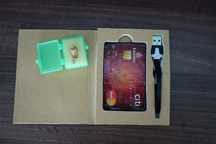 Card GSM cu cartela sim si microcasca japoneza (casca de copiat)