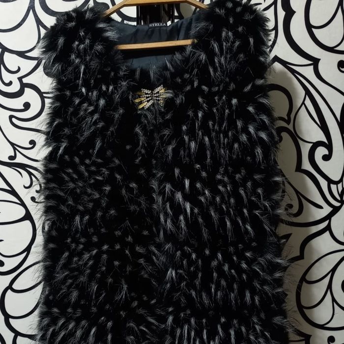 Продам желетку  новая