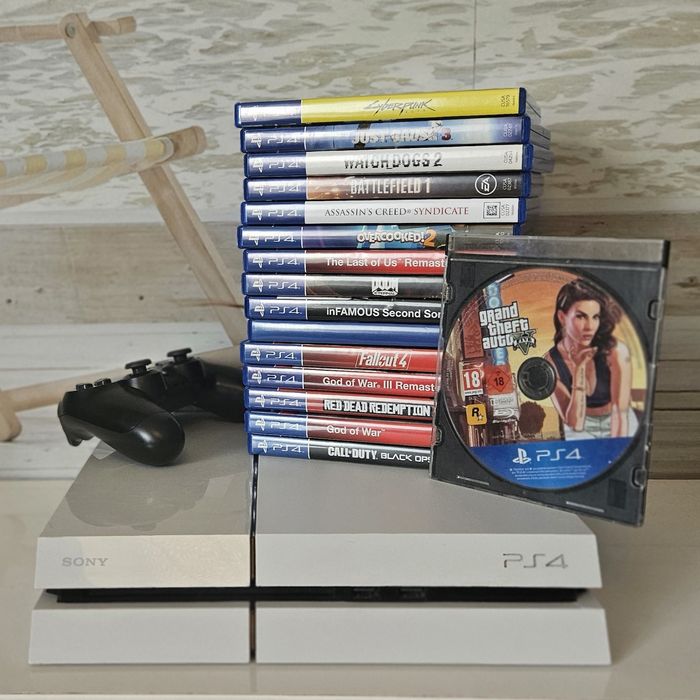 Vând PS4  +  controller original + 16 jocuri