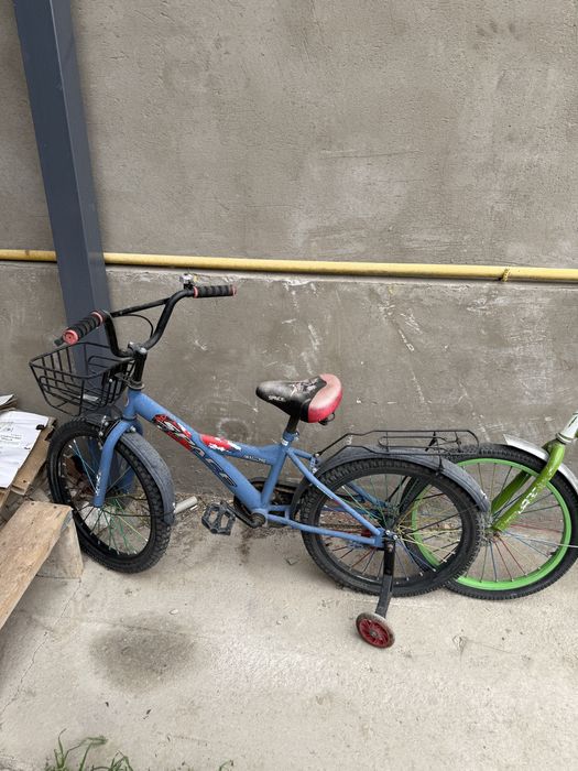 Детский велосипед с боковыми колёсами