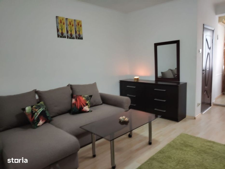 intre costin georgian si mega mall zona Titan  Diham