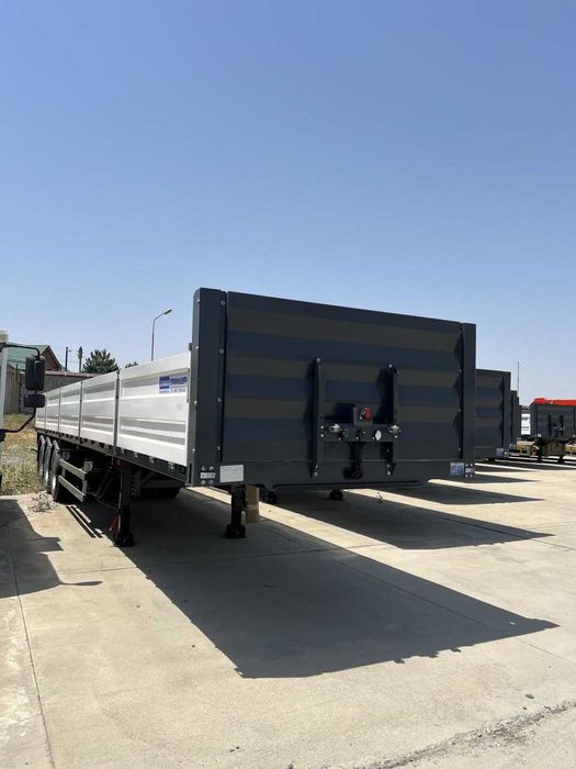 В продаже Новый Полуприцеп бортовой контейнеровоз UzAutoTrailer 12,5 м
