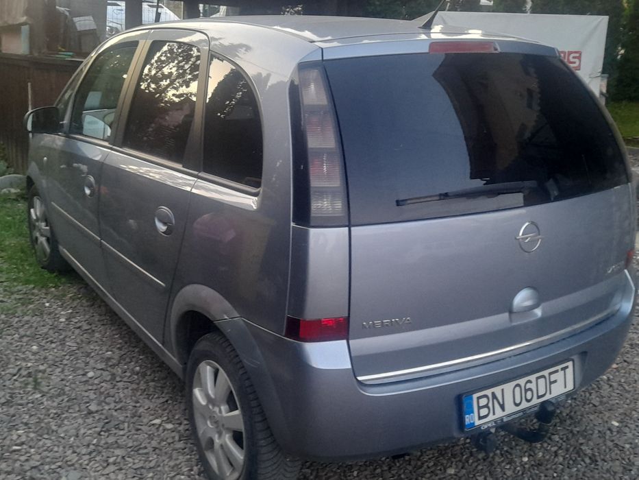 Schimb 2 mașini santa fe jeep 4x4 și opel meriva