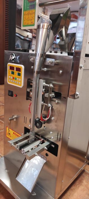 Masina automata de cantarit si impachetat produse granulare