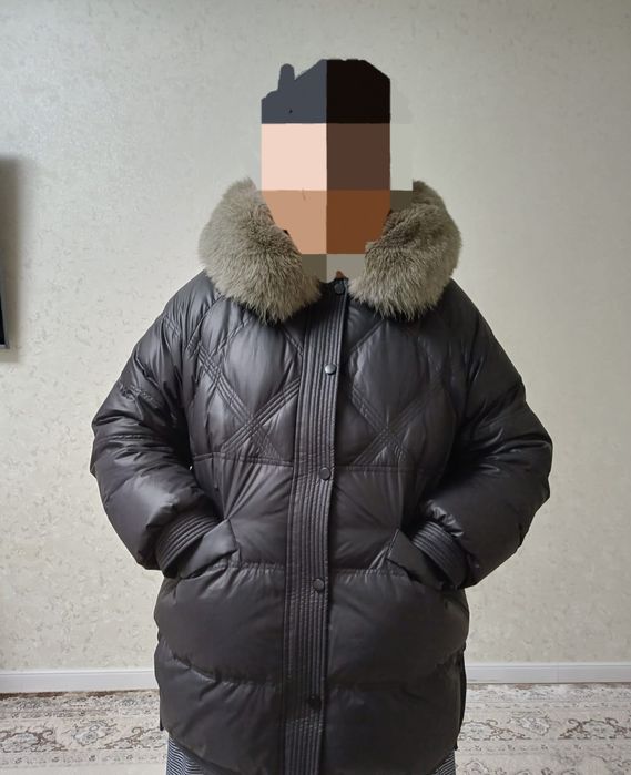 Продам пуховик  зимний