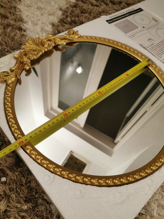Oglinda rotunda aurie  40x40 cm cu rama metalica