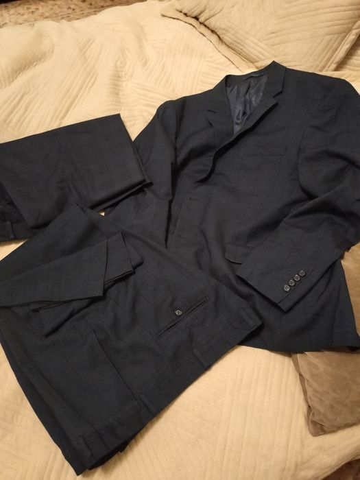 продам срочно мужские костюмы производства Турция