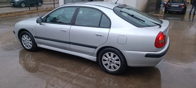 Мицубиши - Mitsubishi Carisma