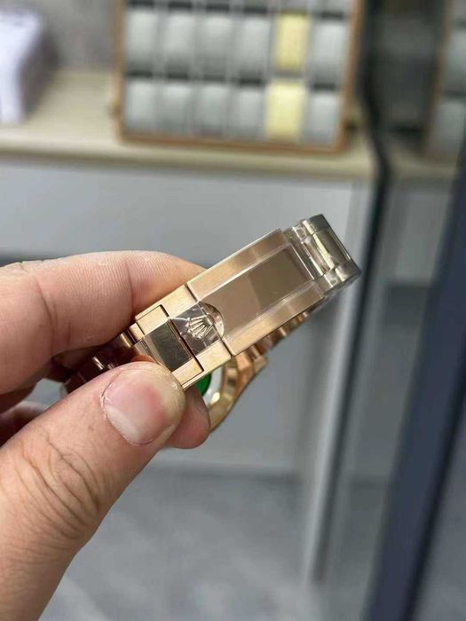 rolex daytona розово злато