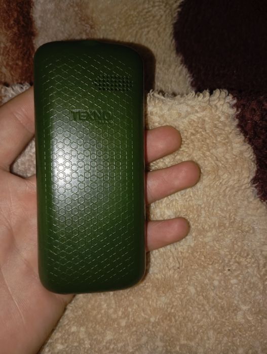Texno max 100 mini knopcniy telefon