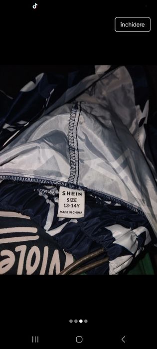 Vând costum de ploaie 13,14 ani