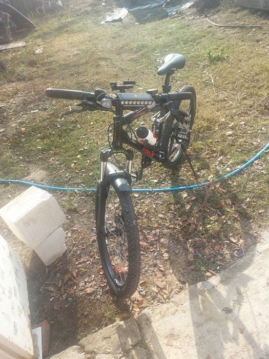 Vând bicicleta full suspensie