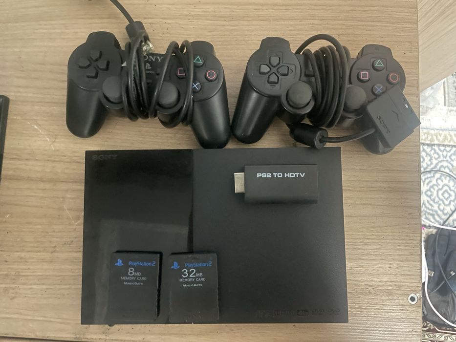 Продам пс2 с дисками