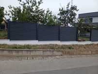 Construim la comanda dvs. garduri si porti din:
- panouri stil jaluzea