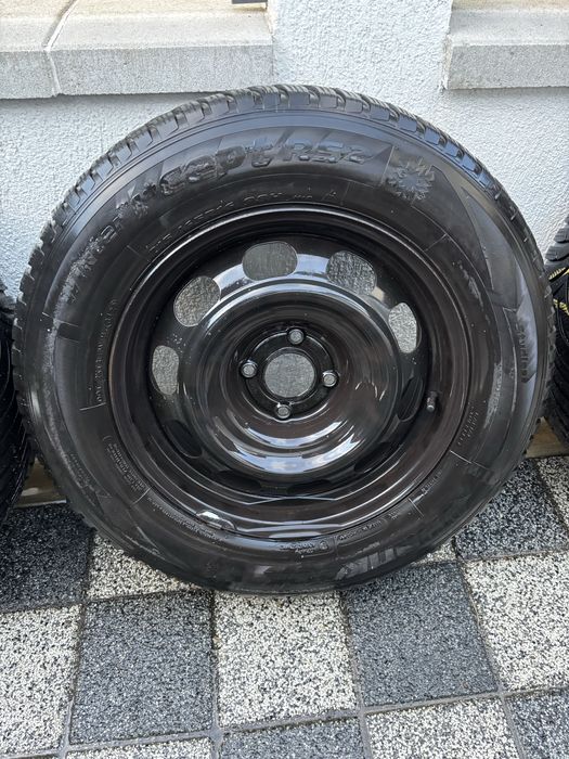 Vând set 4 roti Peugeot cu anvelope de iarna+capace+prezoane