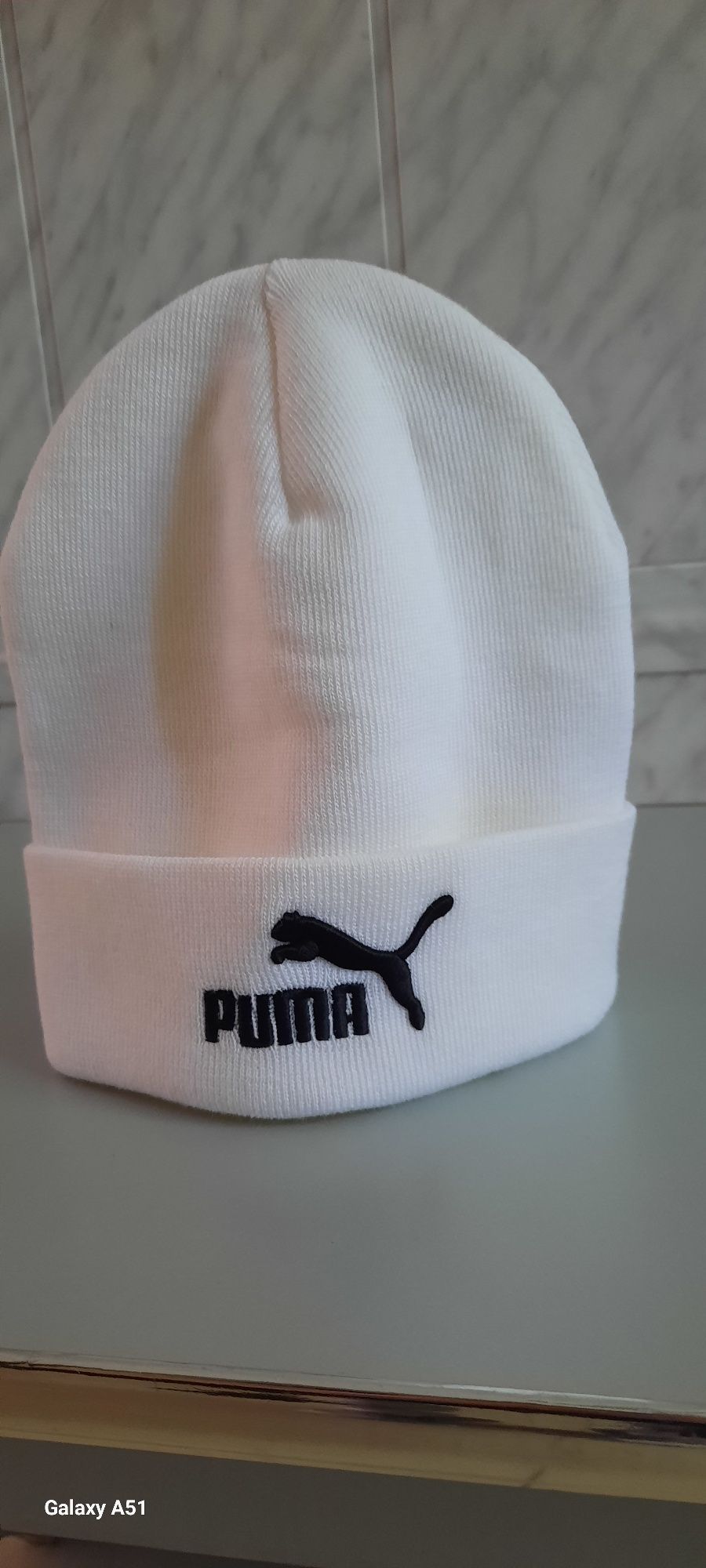 Продам шапку зимнюю