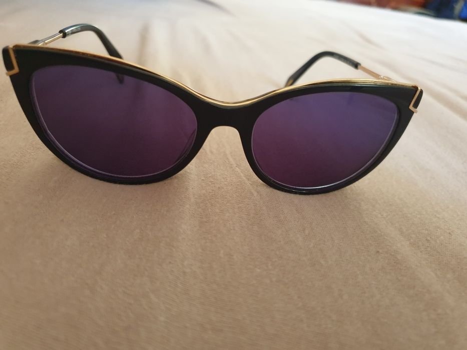 Vand ochelari Michael Kors și Police