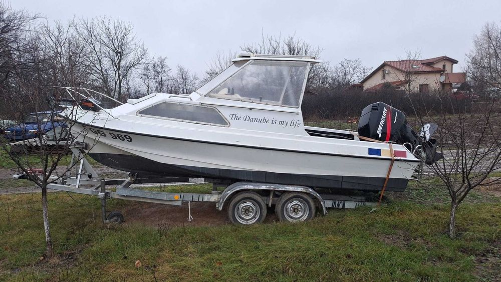 Se vinde barca Shetland 535 cu motor Mercury 75 cp si peridoc doua axe