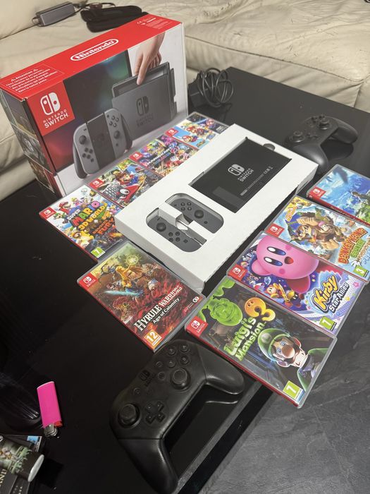 Pachet nintendo switch + 9 jocuri + 2 controlere in stare excelenta