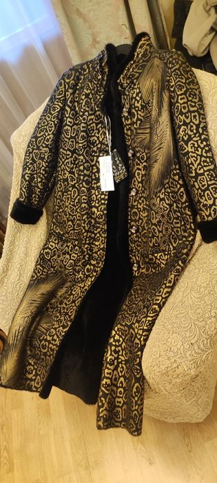 Норкавая дубленка женская