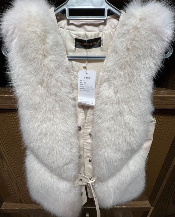 Жилетка женская меховая